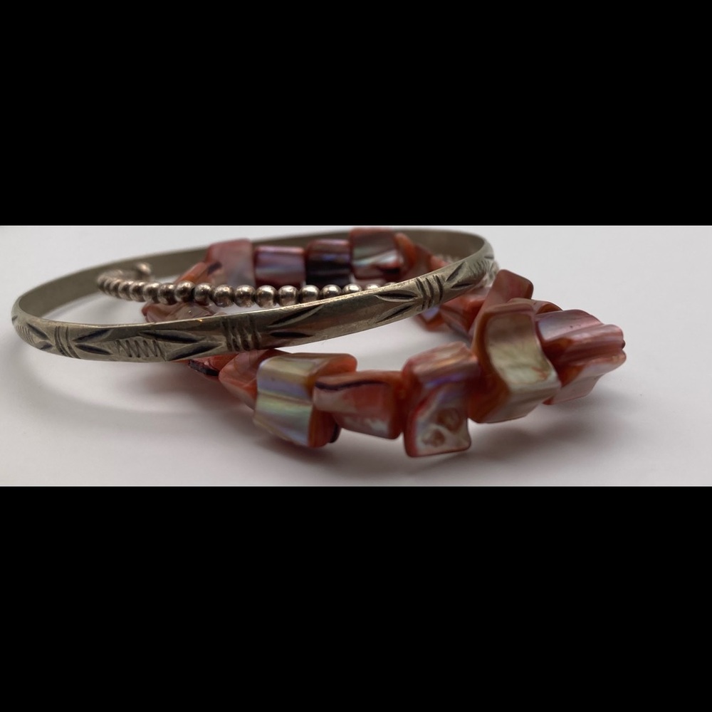 Pink Shells And Silver Bangle Bracelets - image 1